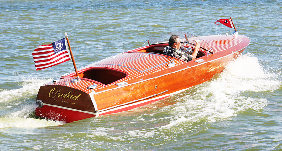 Split Cockpit Chris Craft Racer in water