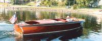 23 ft Chris Craft Custom Runabout Barrel Back in Water