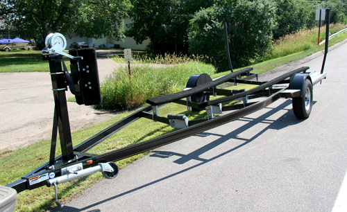 Carpeted bunk trailer for wooden boats